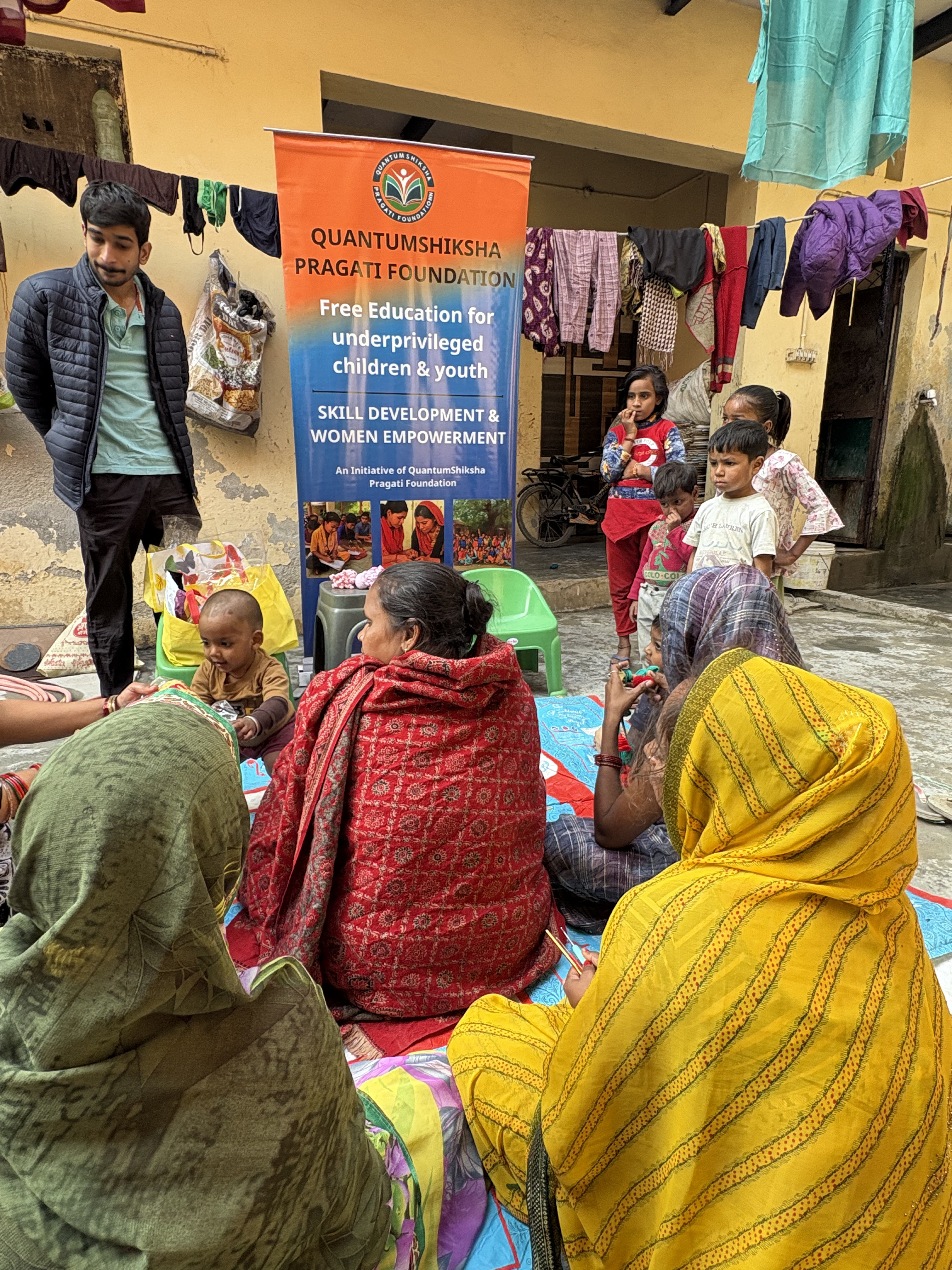 Community outreach meeting with women and children